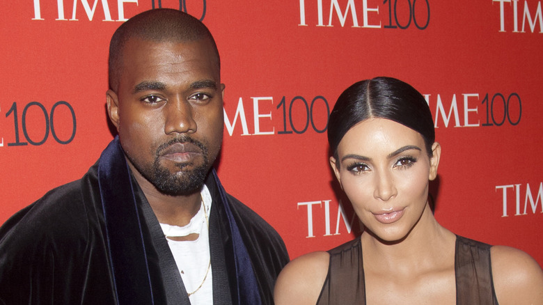 Kanye West and Kim Kardashian on the red carpet.