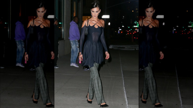 Bella Hadid dress over pants