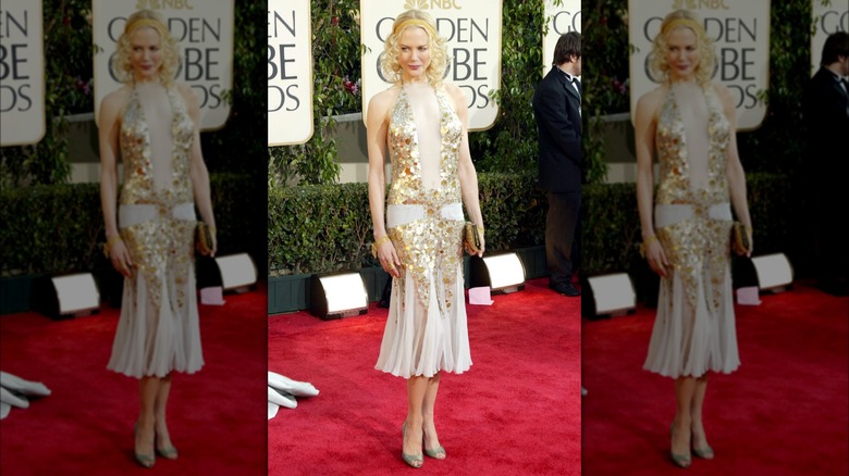 Nicole Kidman wearing a gold-and-cream flapper-style gown