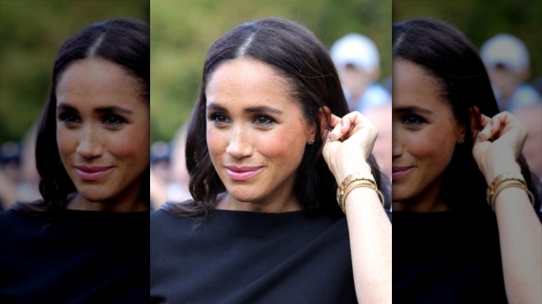 Meghan Markle greeting people