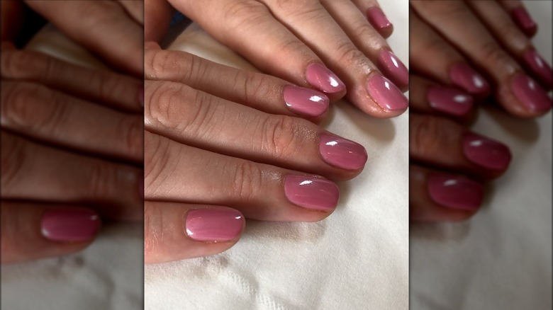 Nails painted light pink 