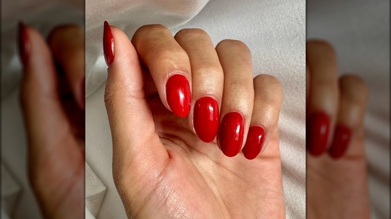 Red almond shaped fingernails 