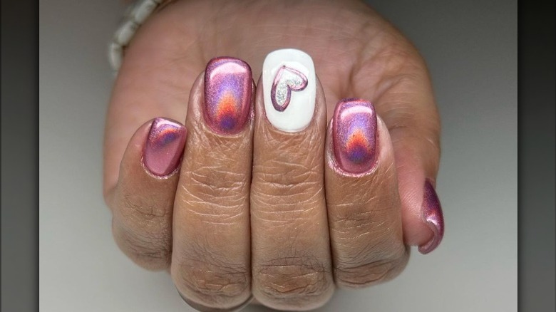 pink chrome manicure with nail art 