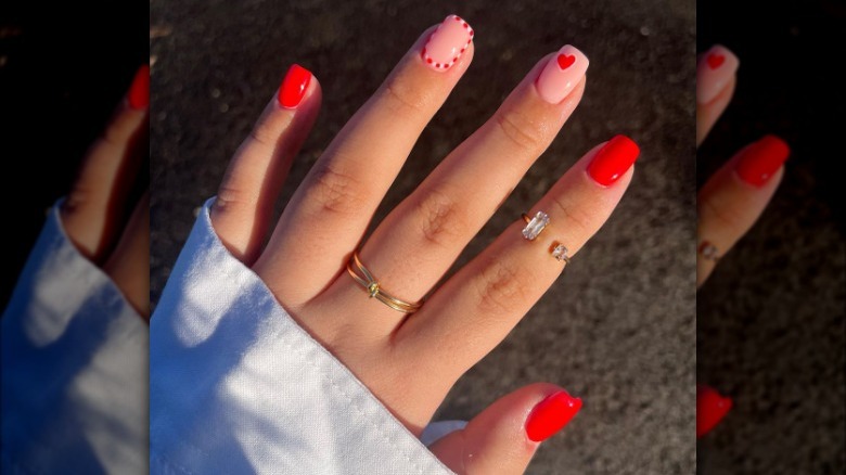 Red and pink manicure with accents