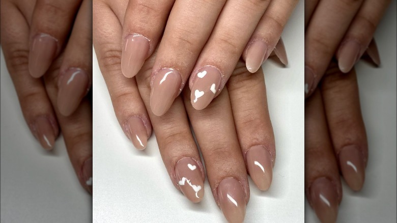 White heart accent nail manicure