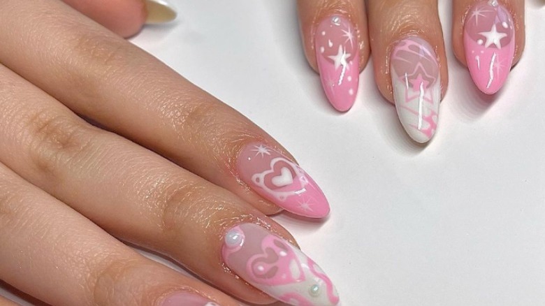 Pink and white airbrushed nails