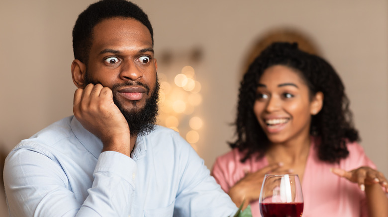 man bored with date