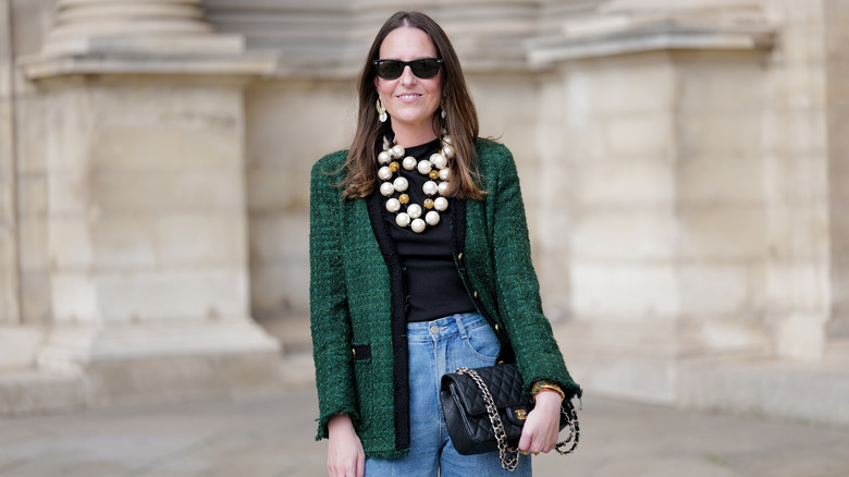 woman with chunky jewelry and outfit