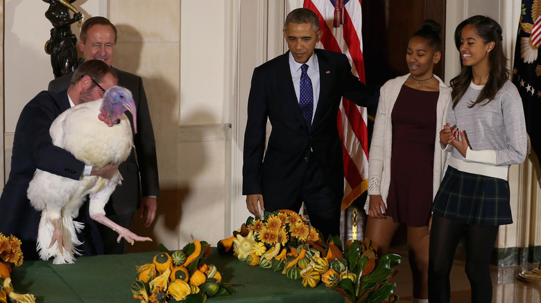 sasha and malia obama wearing thanksgiving outfits