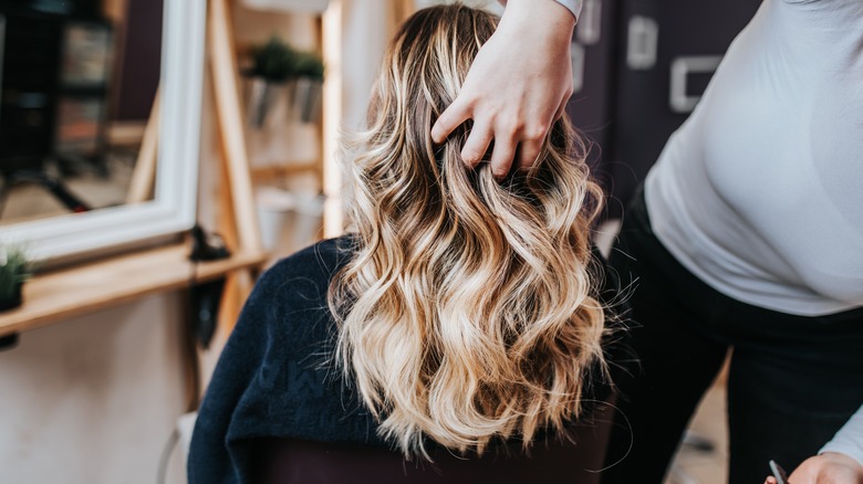 Woman getting her hair done