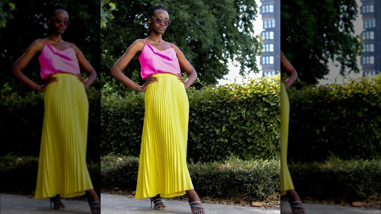 Woman wearing pleated maxi skirt