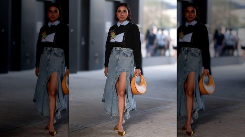 woman in denim skirt