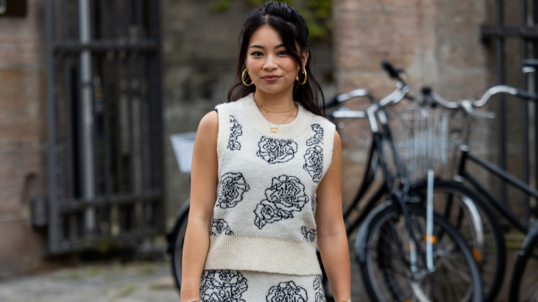 woman in sleeveless sweater