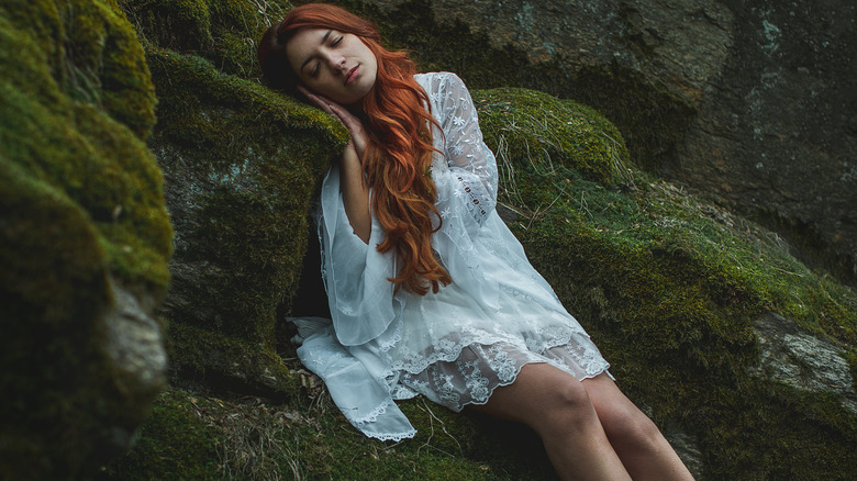 woman dreaming in lace dress