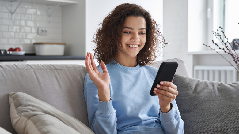 woman talking to friend on phone