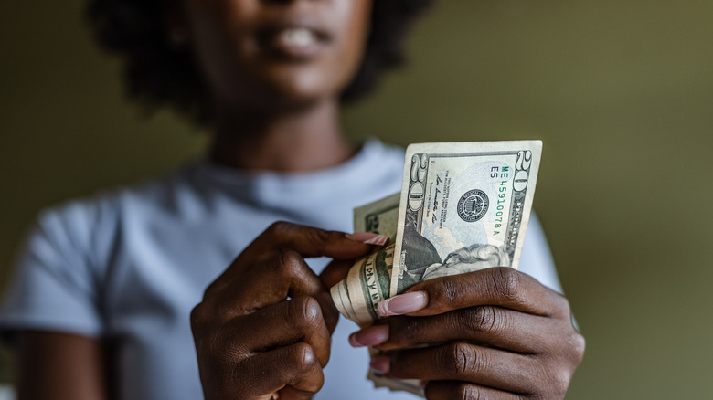 Woman counting money