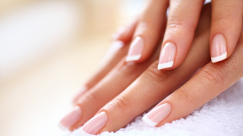 woman's hands showing nails