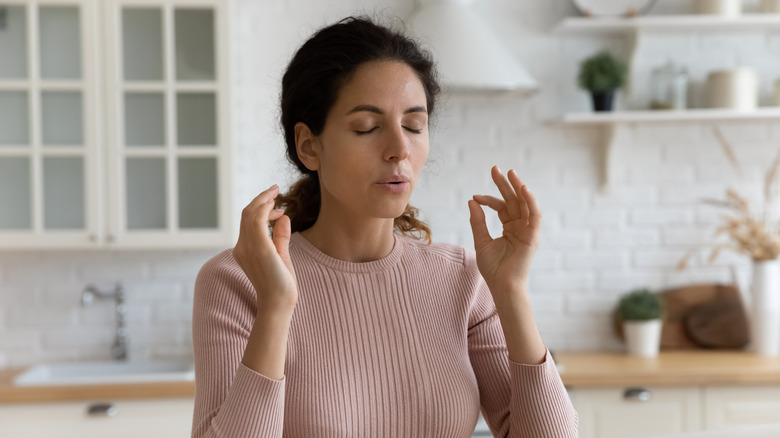 woman practicing her breathing