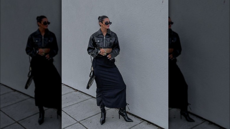 Woman wearing black cargo maxi skirt