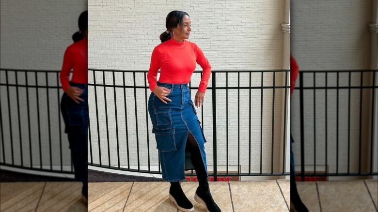 Woman wearing denim cargo midi skirt