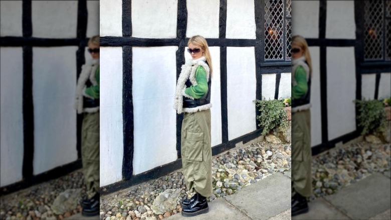 Woman wearing green cargo maxi skirt