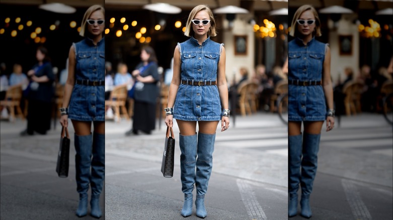 woman wearing denim over-the-knee boots