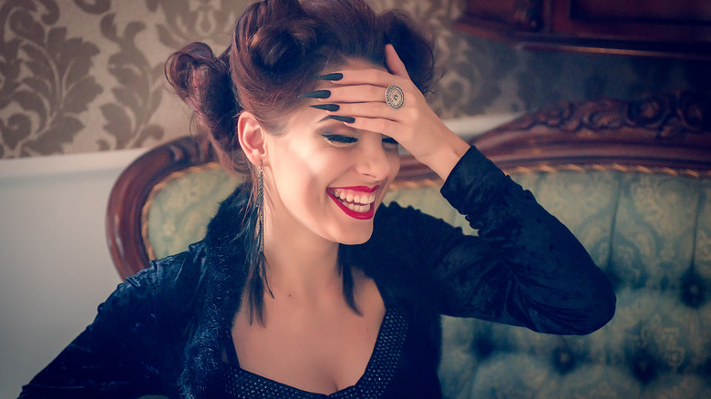 Woman with black nails