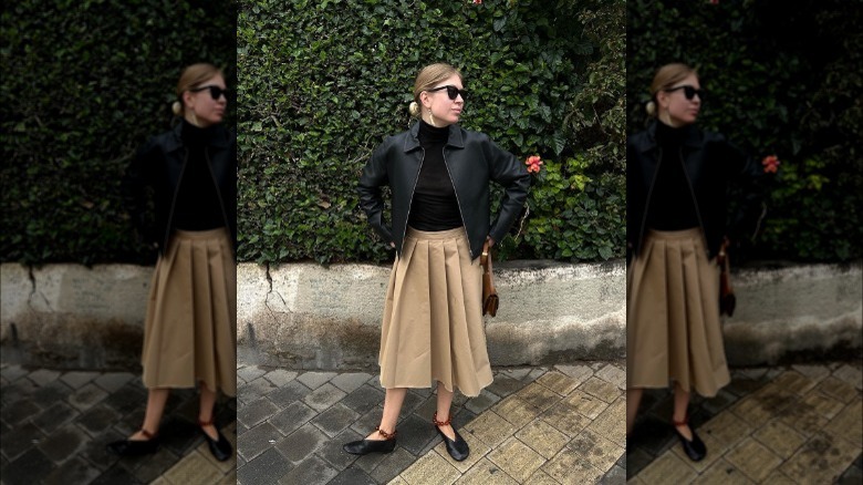 Person in flats, midi skirt