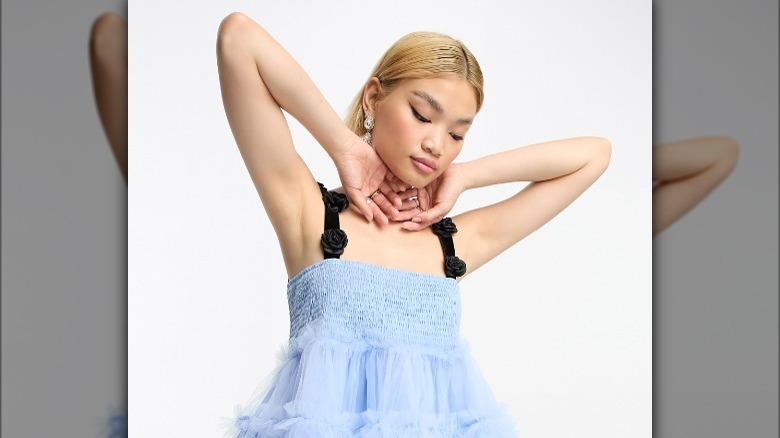 Model wearing tulle corsage dress