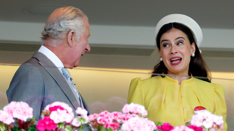 Lady Sophie Windsor wearing bold red lipstick with King Charles III