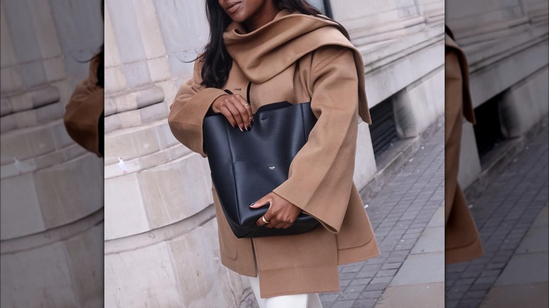 Woman wearing scarf coat