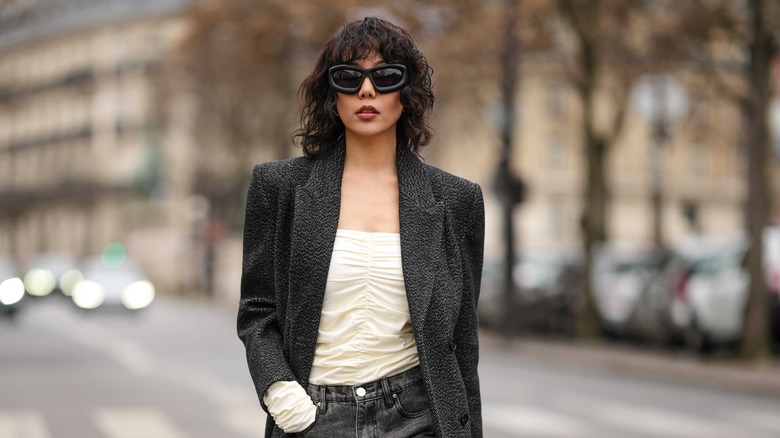 woman with curly shattered bob hair 