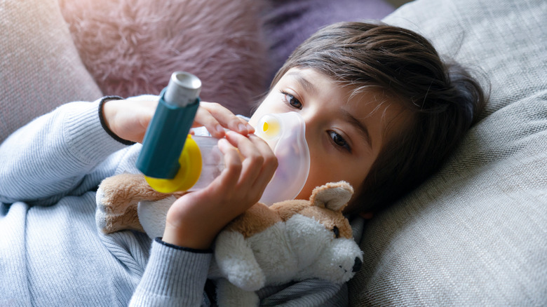 Little boy using a nebulizer