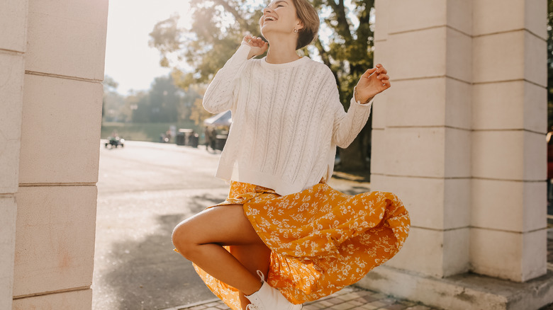 woman in white sweater 