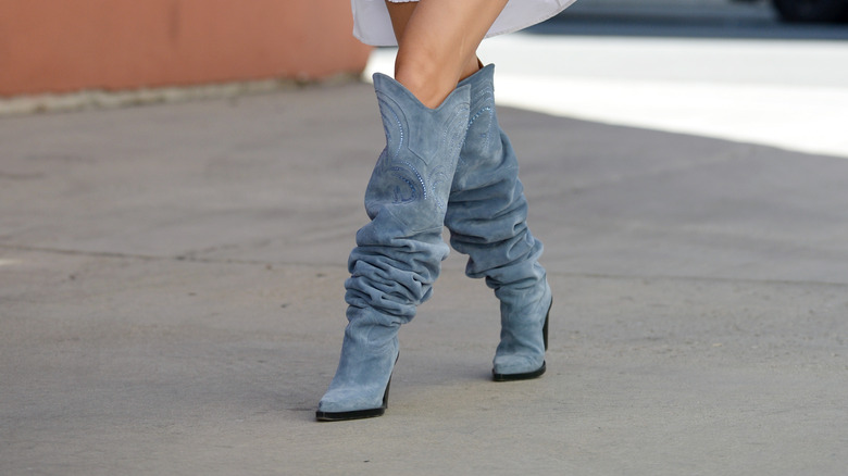 woman wearing slouchy boots