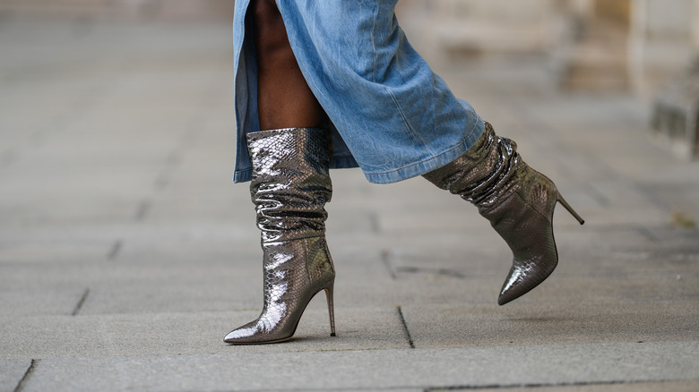 woman wearing slouchy boots