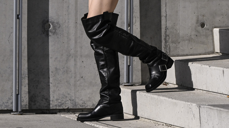 woman wearing slouchy boots