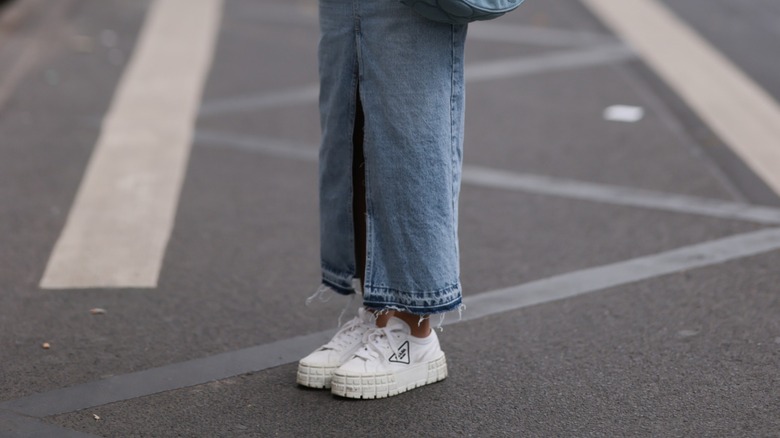 woman wearing platform sneakers