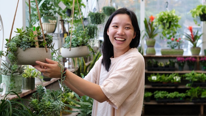 Woman shops for new houseplant 