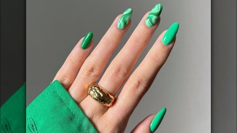 Swirly green oval nails