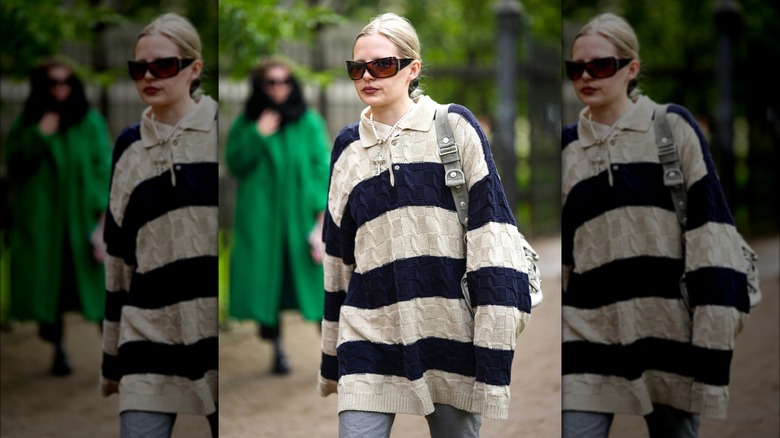 Woman wearing oversized rugby sweater