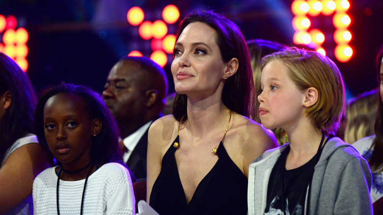Shiloh Jolie-Pitt with family in audience