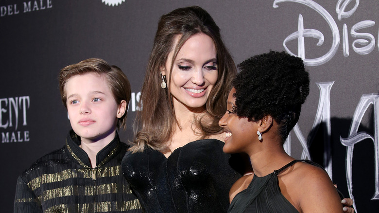 Shiloh Jolie-Pitt with family at premiere
