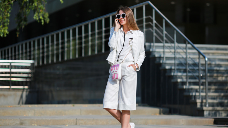 woman wearing bermuda shorts