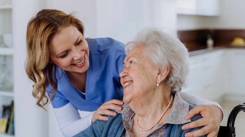 Nurse helping an elderly patient