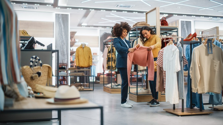 Two women shop in store