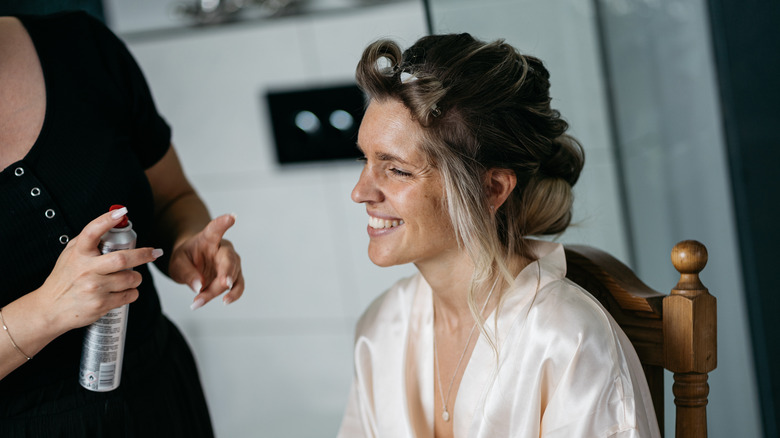 woman wearing hair rollers