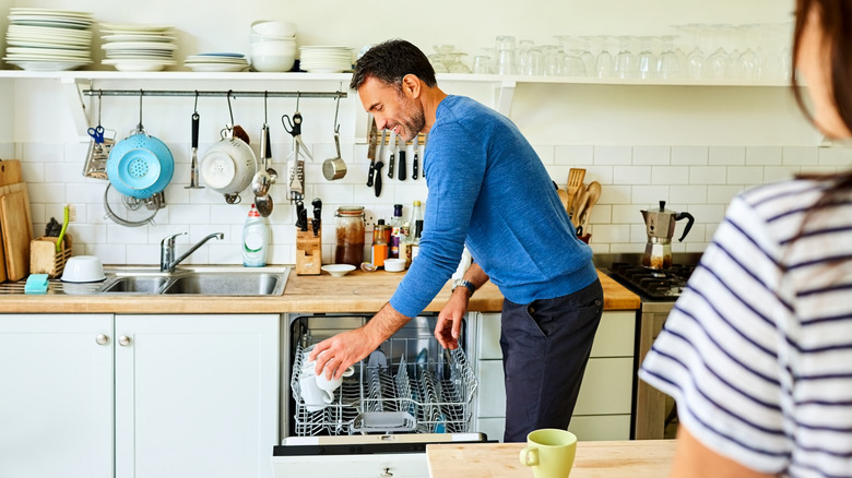 Male partner helping with chores