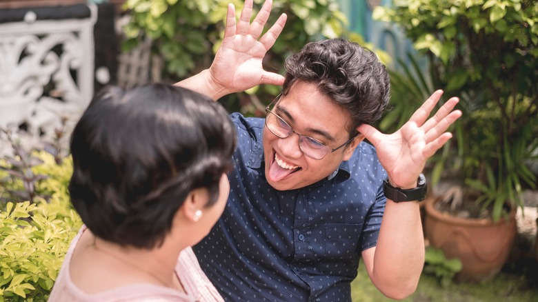 man sticking out tongue