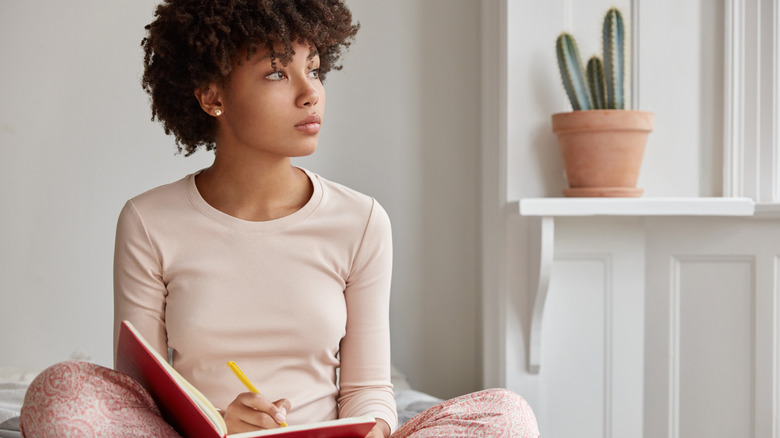 woman with journal